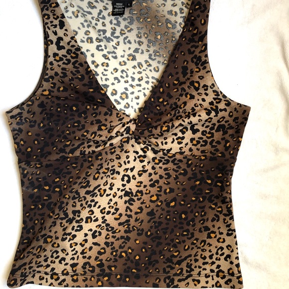 BCBGMaxAzria Tops - ✅Bcbgmaxazria sleeveless animal print top